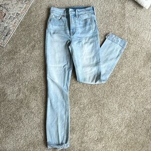 Size 00 (24) GAP cigarette high rise light wash jeans.